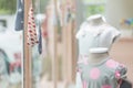 Young girl fashion dress in childrenswear fashion shop window