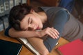 Young girl fell asleep while reading a book. Royalty Free Stock Photo