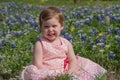 Young Girl in Field of Blue Bonnet Flowers Royalty Free Stock Photo