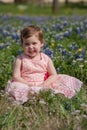 Young Girl in Field of Blue Bonnet Flowers Royalty Free Stock Photo