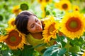 young girl in a field with sunflowers Royalty Free Stock Photo