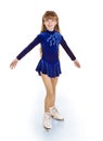 Young girl figure skating..