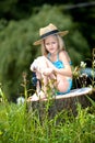 Young girl fishing at a lake