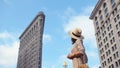 Young girl at the Flatiron building, NYC Royalty Free Stock Photo