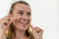 Young girl flossing her teeth Royalty Free Stock Photo