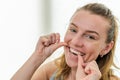 Young girl flossing her teeth Royalty Free Stock Photo