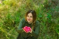 Young girl with flowers in the garden Royalty Free Stock Photo