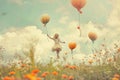 Young Girl Flying Through the Air With Balloons Royalty Free Stock Photo