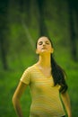 Young girl in the forest Royalty Free Stock Photo