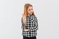 Young girl frowns and looks very dissatisfied, shake forefinger telling no way, scolding or telling off someone, dont give Royalty Free Stock Photo