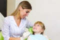 A young girl getting her dental checkup at the dentist