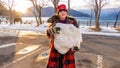 Young girl with giant snowball Royalty Free Stock Photo