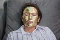 Young girl with gold facial mask Royalty Free Stock Photo