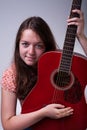 Young girl with guitar portrait