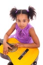 Young girl with guitar on white background Royalty Free Stock Photo