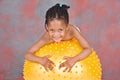 Young girl on gym ball Royalty Free Stock Photo