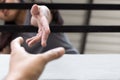 Young girl Hands reaching out from metal bars helping people Royalty Free Stock Photo