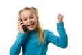 Young girl is happy on the phone