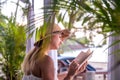 Girl reading a book on the beach Royalty Free Stock Photo