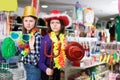 Young girl having fun in festival outfits store Royalty Free Stock Photo