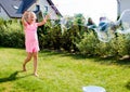 Girl making soap bubbles in home garden Royalty Free Stock Photo