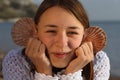 Young girl having fun by the sea.