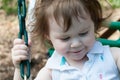 Young girl having fun on a swing Royalty Free Stock Photo