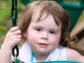 Young girl having fun on a swing Royalty Free Stock Photo