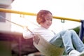 Young girl having fun on the swing. Happy childhood lifestyle Royalty Free Stock Photo