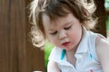 Young girl having fun on a swing set Royalty Free Stock Photo