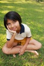 Young girl having a good time in the park Royalty Free Stock Photo