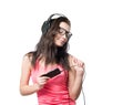 Young girl with headphones on white background Royalty Free Stock Photo