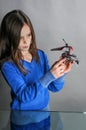 Young girl with helicopter Royalty Free Stock Photo