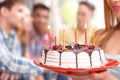 Young girl with her birthday cake