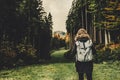 Young girl hiker at forest mountains landscape with backpack travel. Lifestyle wanderlust adventure Royalty Free Stock Photo