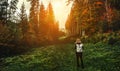 Young girl hiker at forest mountains landscape with backpack travel. Lifestyle wanderlust adventure. Location Carpathian national Royalty Free Stock Photo