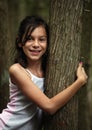 Young girl hiking in the woods Royalty Free Stock Photo
