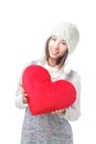 Young girl hold a love heart pillow Royalty Free Stock Photo