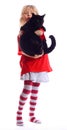 A young girl holding black cat Royalty Free Stock Photo