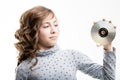 Young girl holding CD-ROM disk Royalty Free Stock Photo