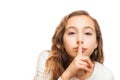 Young girl with holding finger on her lips on silence gesture isolated Royalty Free Stock Photo