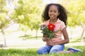 Young girl holding flowers