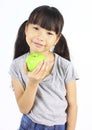 Young girl holding green apple Royalty Free Stock Photo