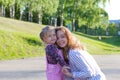 Young girl holding hands with smiling and beautiful child Royalty Free Stock Photo