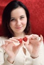 Young girl holding heart smiling cute, Royalty Free Stock Photo