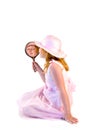 Young girl holding a mirror Royalty Free Stock Photo