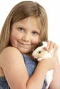 Young Girl Holding Pet Guinea Pig Royalty Free Stock Photo