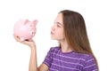 Young girl holding piggybank Royalty Free Stock Photo