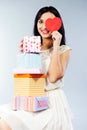 Young girl holding present boxes Royalty Free Stock Photo