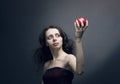 Young girl holding a red apple Royalty Free Stock Photo